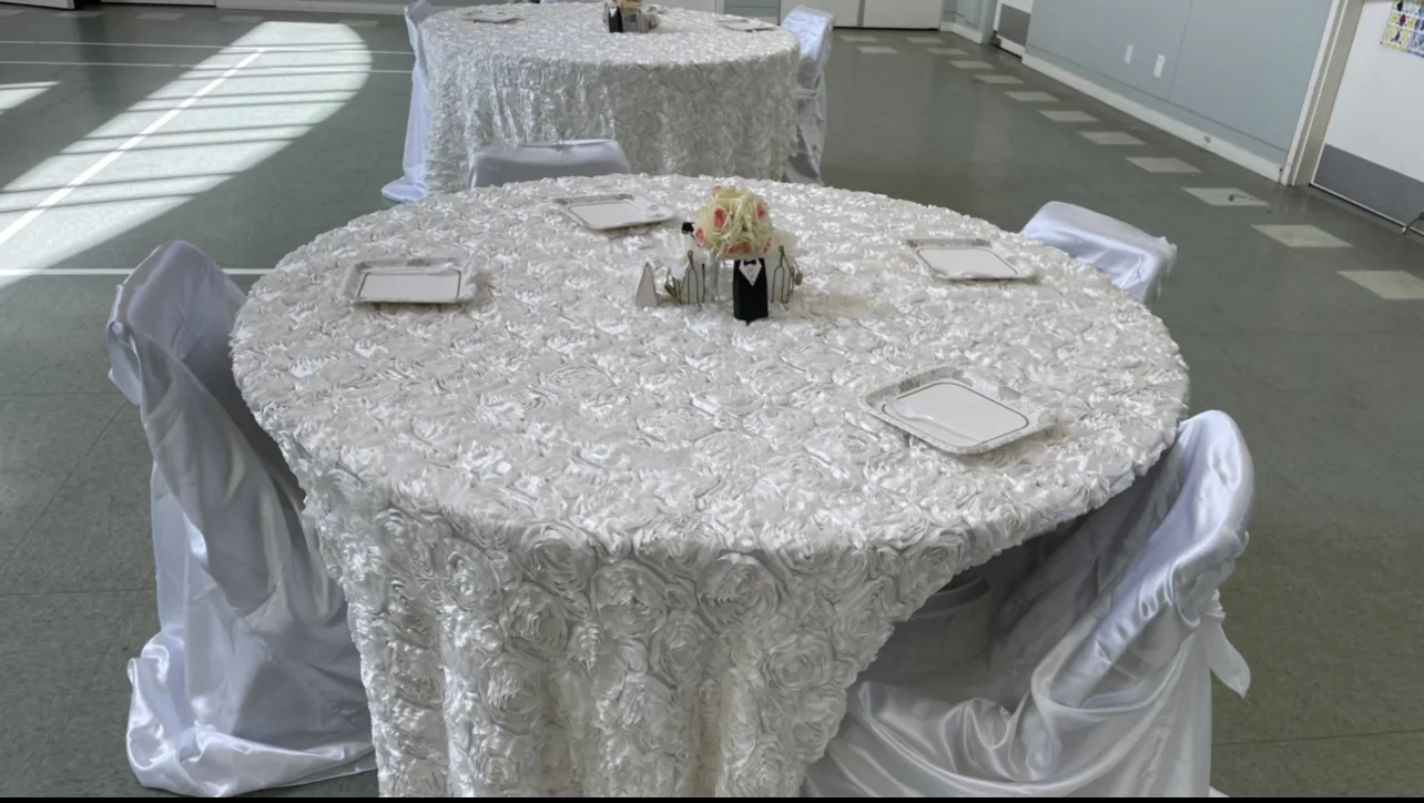 Al-Mustafa main hall with tables and chairs set up